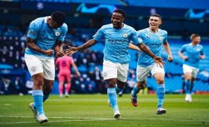 sterling, foden and jesus celebrate goal manchester city