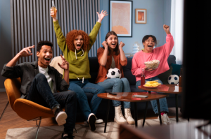 Group of Friends Watching Football at Home